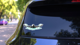 Female Butterfly Swimmer Sticker on a Rear Car Window (New) example