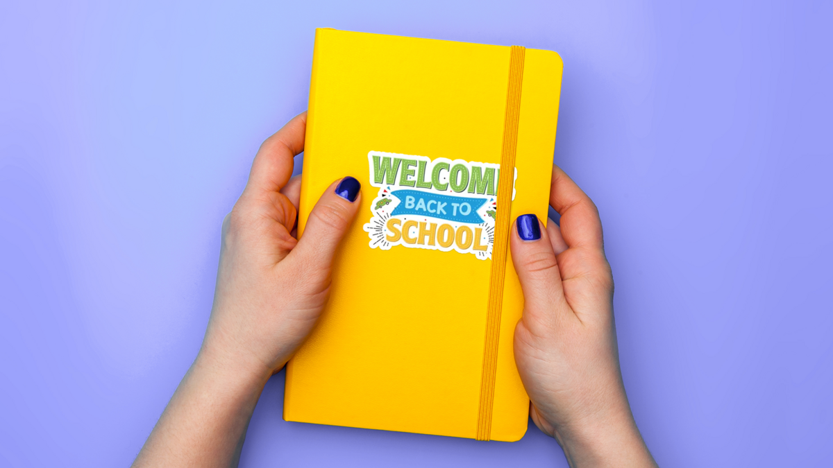 Custom Celebrate First Day of School Sticker on Notebook