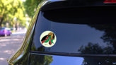 Fisted Hand Holding Kenyan Flag Sticker on a Rear Car Window (New) example
