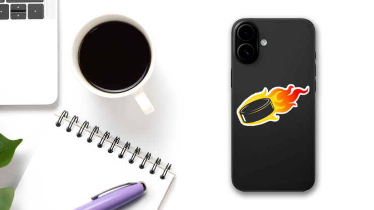 Flaming Hockey Puck Sticker on a Phone (New) example