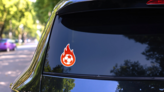 Flaming Soccer Sticker on a Rear Car Window (New) example