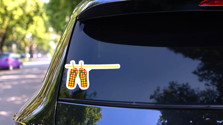Flip Flops On A Line Sticker on a Rear Car Window (New) example