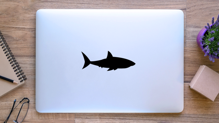 Floating Shark Silhouette Sticker on a Laptop (New) example