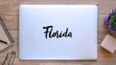 Florida Hand Drawn Lettering Sticker on a Laptop (New) example