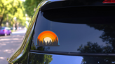 Forest Landscape Trees Silhouettes With Sunset On Background. on a Rear Car Window (New) example