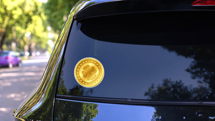 Four-leaf Clover Gold Coin With Stars Sticker on a Rear Car Window (New) example