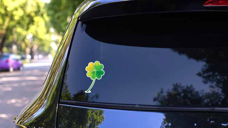 Four Leaf Clover Green & Yellow Sticker on a Rear Car Window (New) example
