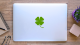 Four Leaf Clover Icon Sticker on a Laptop (New) example