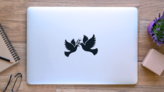 Free Flying Doves Symbol With Branch Sticker on a Laptop (New) example