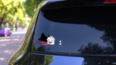 Fun Hero Comic Sticker on a Rear Car Window (New) example