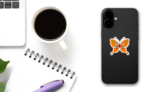 Fun Orange Butterfly Sticker on a Phone (New) example