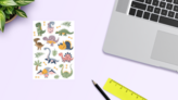 Funny Dinosaurs Sticker Sheet on a Desk (New) example