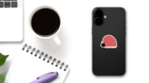 Funny Red Ladybug Smiling Sticker on a Phone (New) example