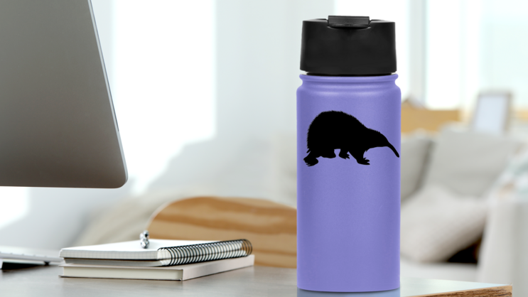 Fuzzy Anteater Sticker on a Water Bottle On Desk example
