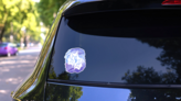 Gemini Zodiac Sign On Watercolor Background Sticker on a Rear Car Window (New) example