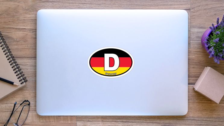 Germany, D, Flag, Oval Sticker on a Laptop (New) example