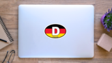 Germany, D, Flag, Oval Sticker on a Laptop (New) example