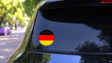 Germany Flag Button Circle Sticker on a Rear Car Window (New) example