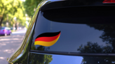 Germany Flag Swoosh Sticker on a Rear Car Window (New) example
