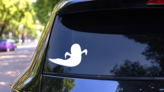 Ghost Silhouette Sticker on a Rear Car Window (New) example