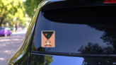 Girl In Lotus Position Meditates Universe Sticker on a Rear Car Window (New) example