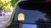 Golden Mask Ecuador Sticker on a Rear Car Window (New) example