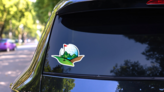 Golf Ball and Scenic Views Sticker on a Rear Car Window (New) example