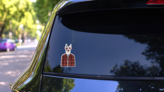 Great Dane Hipster Sticker on a Rear Car Window (New) example
