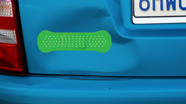 Green Band Aid Bandage Sticker on a Dented Car example