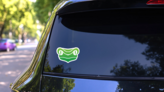 Green Frog Head Logo Sticker on a Rear Car Window (New) example