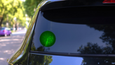 Green Radar With Targets Sticker on a Rear Car Window (New) example