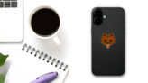 Growling Bear Mascot Sticker on a Phone (New) example