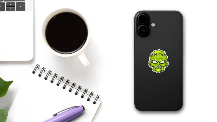 Growling Cartoon Zombie Face Sticker on a Phone (New) example