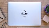 Hand Drawn Libra Zodiac Simple Lettering Sticker on a Laptop (New) example