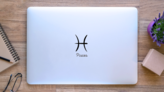 Hand Drawn Pisces Simple Line Sticker on a Laptop (New) example
