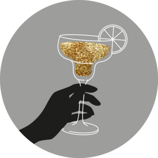 Hand Holding Glitter Cocktail Glass With Citrus Sticker