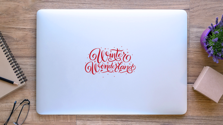 Hand Lettering Winter Wonderland Typography Sticker on a Laptop (New) example