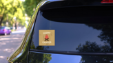 Happy Camper Campfire Sticker on a Rear Car Window (New) example