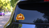 Happy Camper Hand Lettering Badge Sticker on a Rear Car Window (New) example