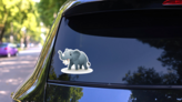 Happy Elephant Cartoon Sticker on a Rear Car Window (New) example