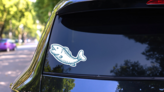 Happy Fish Illustration Sticker on a Rear Car Window (New) example