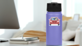 Happy Young Man Driving Red Car Sticker on a Water Bottle (New) example