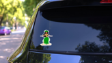 Hawaiian Girl Dancing Hula Illustration Sticker on a Rear Car Window (New) example