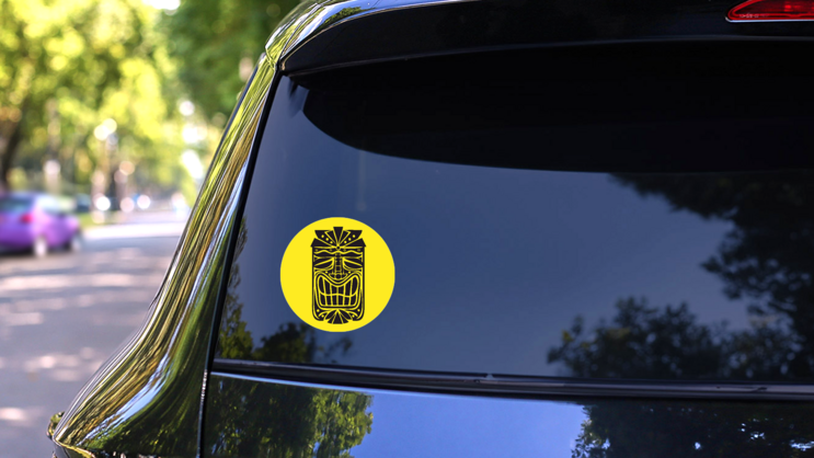 Hawaiian Tiki Mask On Bright Yellow Sticker on a Rear Car Window (New) example