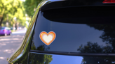 Heart Icon With Glare Nostalgia For The 2000 Years Sticker on a Rear Car Window (New) example
