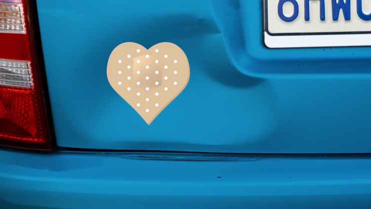 Heart Shaped Bandage Sticker on a Dented Car example