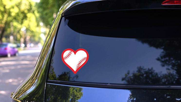 Heart With Seams Baseball Or Softball Sticker on a Rear Car Window (New) example