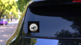 Hello Kitty Scary Cat Bones Sticker on a Rear Car Window (New) example