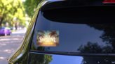 Hello Summer Sunset Blur Beach Background Sticker on a Rear Car Window (New) example