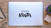 Hello Winter Handlettering Sticker on a Laptop (New) example